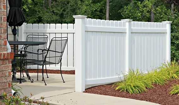 White vinyl privacy fence installed by Independence, MO fencing company.