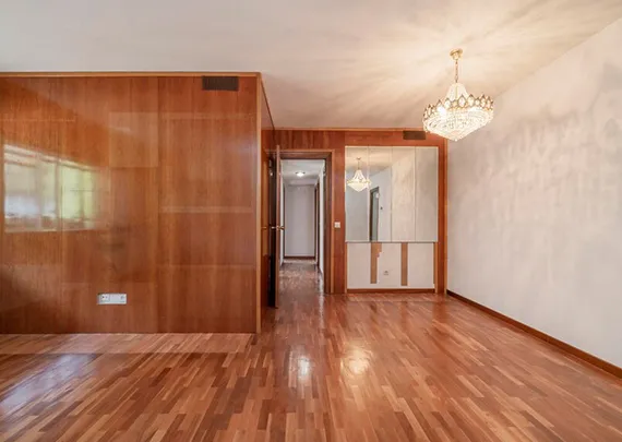 Living room showcasing expertly repaired laminate flooring in Independence, MO.