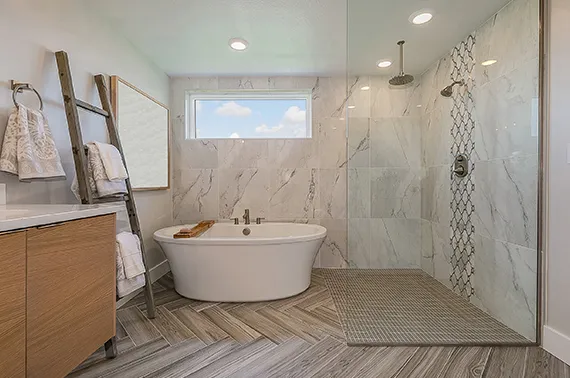 Tile flooring and wall tiling installation in Liberty MO bathroom.